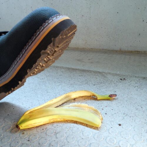 boots about to step on a banana