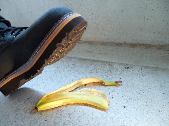 boots about to step on a banana